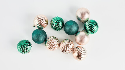 panoramic festive banner. composition of gold and turquoise Christmas decorations on a white background. simple flat minimalist layout