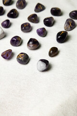 Viking ancient rune stones carved on gemstones.
Rune stone on a wooden table.
