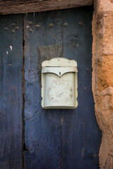 Mailbox on a Blue Door in a Village in Provence, France