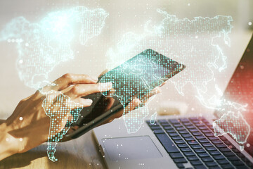 Abstract creative world map and finger clicks on a digital tablet on background, international trading concept. Multiexposure