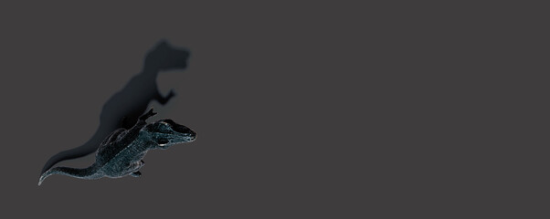 Tyrannosaurus toy with shadow from above - flat lay