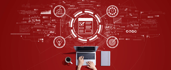 Project management theme with person working with a laptop