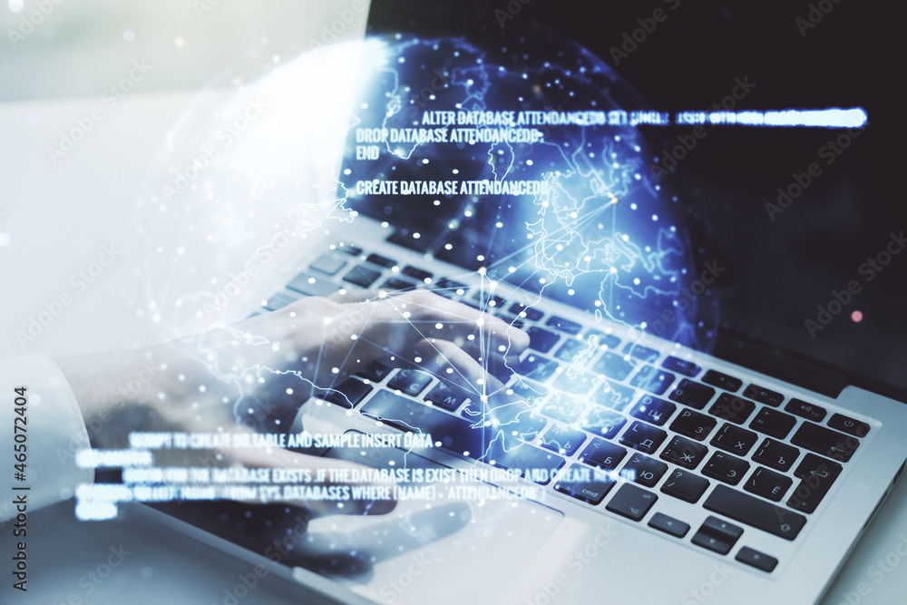 Poster double exposure of abstract programming language hologram with world map and hands typing on laptop 