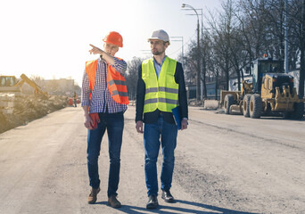 Field Inspectors at Building Construction Site. Land inspector checking a construction site.