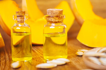 Pumpkin seed oil in a bottle. Selective focus.