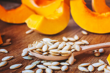 Pumpkin seed oil in a bottle. Selective focus.