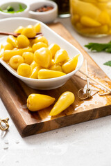 Canned jalapeno peppers close-up. Homemade pickled hot peppers.