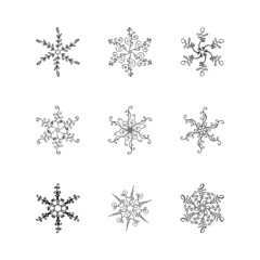 Bundle of Christmas vector calligraphic snowflakes. Hand drawn set icon in trendy flat style isolated on white background. Xmas snow winter illustration