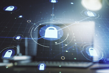 Creative idea concept with lock symbol and microcircuit illustration on modern laptop background. Protection and firewall concept. Multiexposure