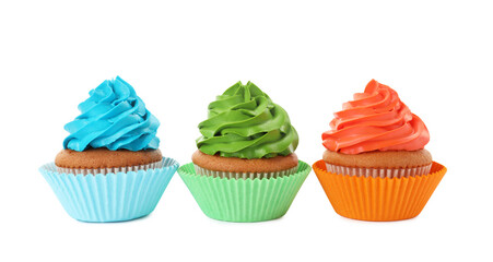 Different delicious colorful cupcakes on white background