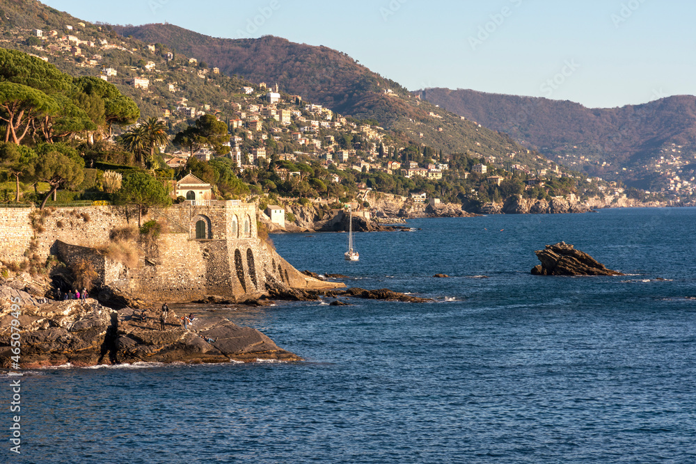 Wall mural sunset on the sea promenade in Genoa Nervi in Liguria