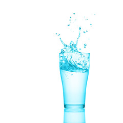 Glass of fresh water with splash and reflection isolated on white background.