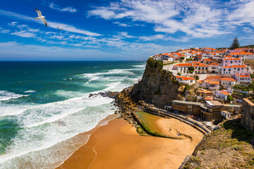 Azenhas do Mar is a seaside town in the municipality of Sintra, Portugal. Close to Lisboa. Azenhas do Mar white village, cliff and ocean, Sintra, Portugal. Azenhas Do Mar, Sintra, Portugal. - obrazy, fototapety, plakaty