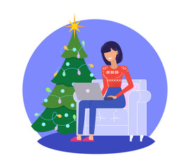 Christmas and New Year holidays. Woman sitting near Christmas tree with a laptop.