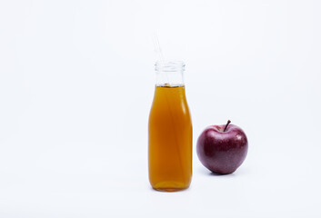 Red Apple and bottle of apples juice	