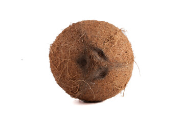 Brown coconut isolated on white background, close-up
