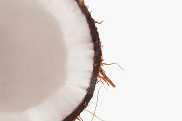 Brown coconut isolated on white background, close-up