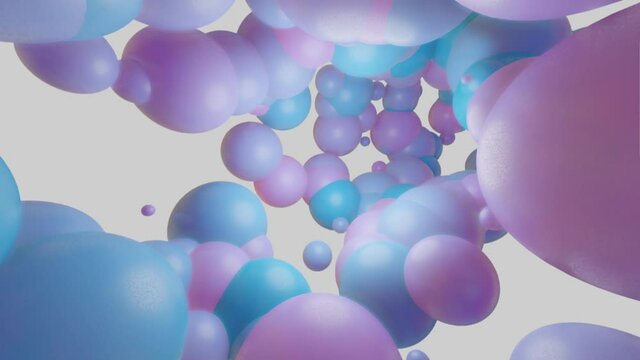 flying the camera through many different balls of delicate color. 3d render. looped animated background