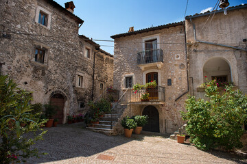 Fototapeta na wymiar Castelvecchio Calvisio medieval town, square, steps, archs and medieval buidings.
