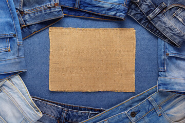 Blue jeans denim background and burlap hessian sacking texture