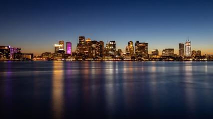 Fototapeta na wymiar Boston skyline at sunset from the East reflection