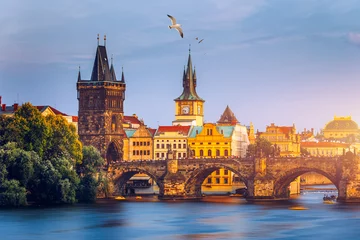 Foto op Canvas Charles Bridge, Old Town and Old Town Tower of Charles Bridge, Prague, Czech Republic. Prague old town and iconic Charles bridge, Czech Republic. Charles Bridge (Karluv Most) and Old Town Tower. © daliu