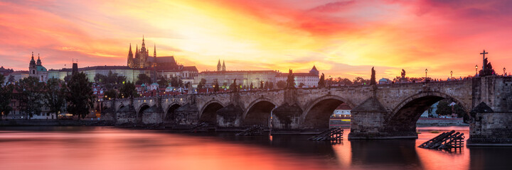 Fototapeta na wymiar Charles Bridge at sunset with colorful sky, Prague, Czech Republic. Prague old town and iconic Charles bridge and Castle, Czech Republic. Charles Bridge (Karluv Most), Old Town Tower and Castle.