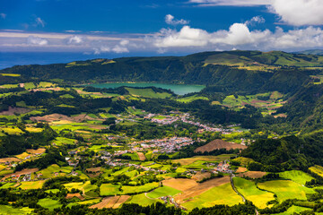 View of Furnas town and lake (Lagoa das Furnas) on Sao Miguel Island, Azores, Portugal from the...