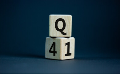 From 4th to 1st quarter symbol. Turned wooden cubes and changed words 'Q4' to 'Q1'. Beautiful grey...