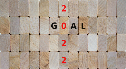 Planning 2022 goal new year symbol. Wooden blocks with words 'Goal 2022'. Beautiful wooden background, copy space. Business, 2022 goal new year concept.