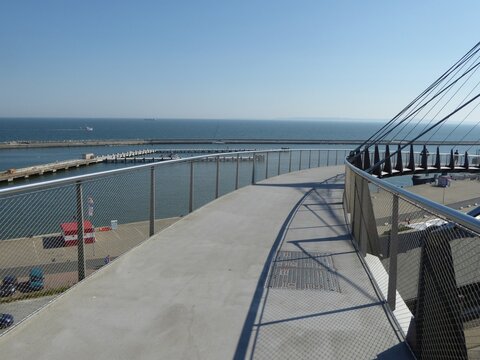 This curved pedestrian bridge connects the upper part of the city of Sassnitz, Ruegen Island, Mecklenburg-Western Pomerania, Germany with the city harbor