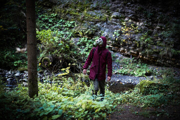 Fototapeta premium Ecological catastrophy. Post apocalyptic survivor in gas mask. Man at forest.