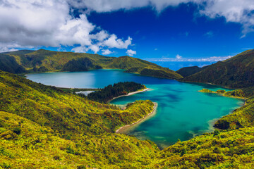 Naklejka na ściany i meble Azores panoramic view of natural landscape, wonderful scenic island of Portugal. Beautiful lagoons in volcanic craters and green fields. Tourist attraction and travel destination. Azores, Portugal.