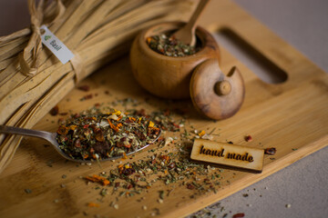 craft handmade raw pasta with spices and herbs on the board