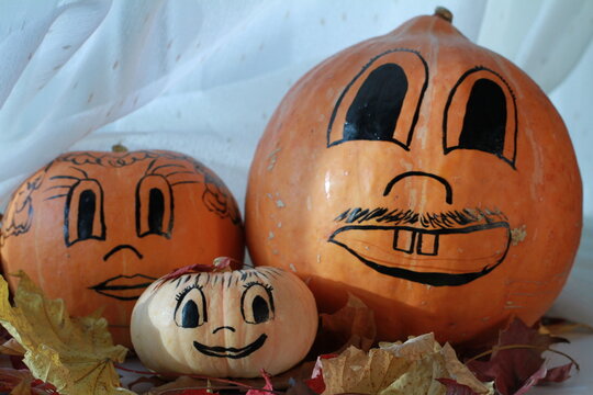 Holiday, Halloween! Pumpkin family celebrates All Saints Day.