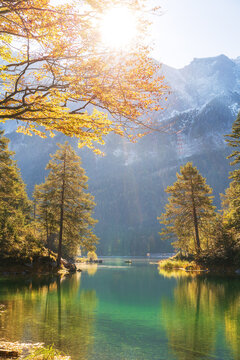 Lake Eibsee at the bottom of mountain Zugspitze at sunrise, walking hiking near the lake