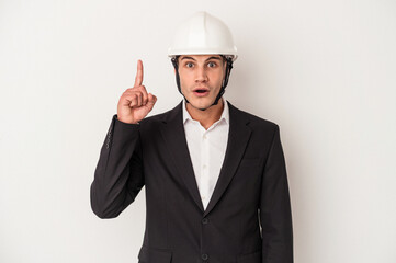 Young architect caucasian man isolated on white background having an idea, inspiration concept.