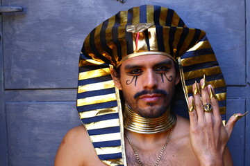 Traditional egyptian man with golden jewelry 