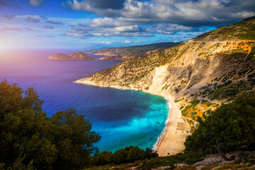 Famous Myrtos beach from overlook, Kefalonia (Cephalonia), Greece. Myrtos beach, Kefalonia island, Greece. Beautiful view of Myrtos beach, Ionian Island, Kefalonia (Cephalonia), Greece.