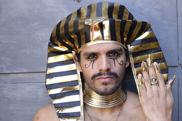 Traditional egyptian man with golden jewelry