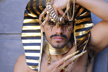 Traditional egyptian man with golden jewelry