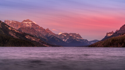 Fototapeta na wymiar Sunset over Upper Waterton Lake in Waterton Lakes National Park in the Canadian Rockies just north of the US Border
