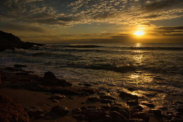 Fototapeta na wymiar The coast in the Mediterranean Sea at sunrise