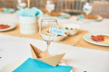 nice decoration of children's table, classic and with craft paper for celebrations table, pastel and blue colors