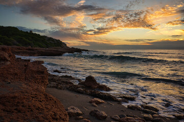 The coast in the Mediterranean Sea at sunrise