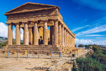 Fototapeta premium Valley of the Temples (Valle dei Templi), The Temple of Concordia, an ancient Greek Temple built in the 5th century BC, Agrigento, Sicily. Temple of Concordia, Agrigento, Sicily, Italy