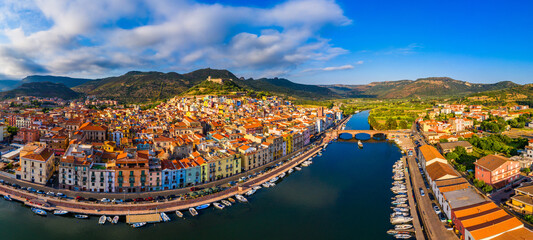 Beautiful view of Bosa town, Sardinia island, Italy. Travel destination. Bosa town with Ponte Vecchio bridge across the Temo river. Marvelous morning view of Sardinia island, Italy, Europe.