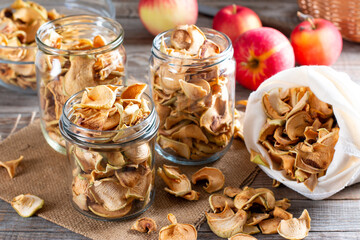 Dried apples in a glass jar on table. Baby food. World food day. kids’ food.
