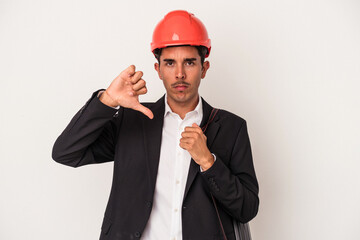Young architect mixed race man isolated on white background showing a dislike gesture, thumbs down. Disagreement concept.