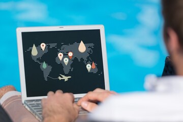 Man using software on laptop with different graphs and charts